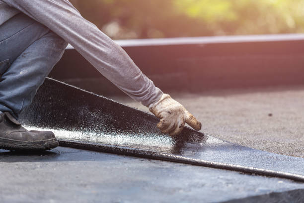Professional Basement Waterproofing technician working in Burt, MI